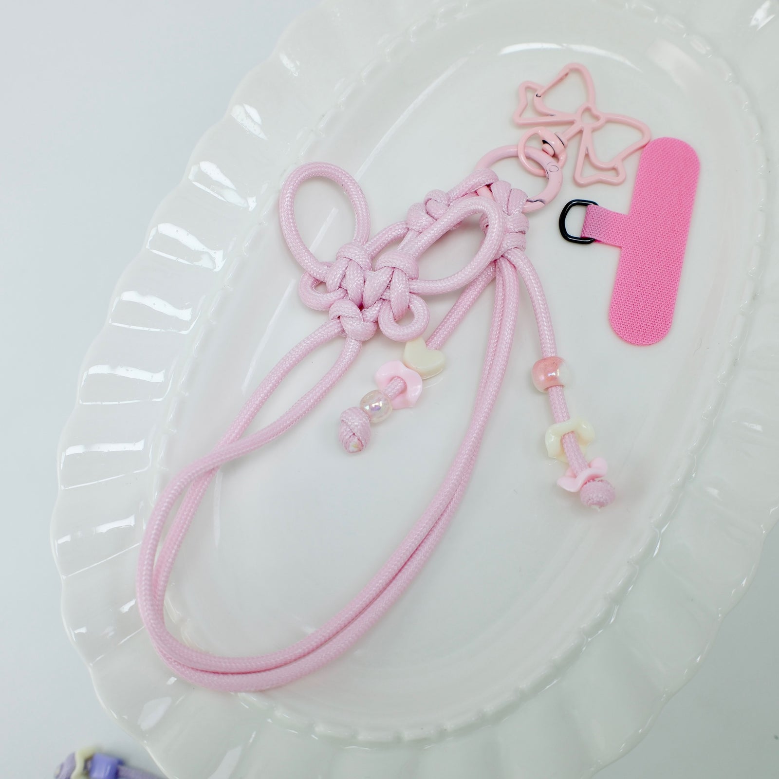 大人可愛いバレエコア。ハンドメイド編み上げリボンスマホストラップ