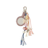 上品な輝きのポータブルミラー付き！パールとリボンのマルチストラップチャーム